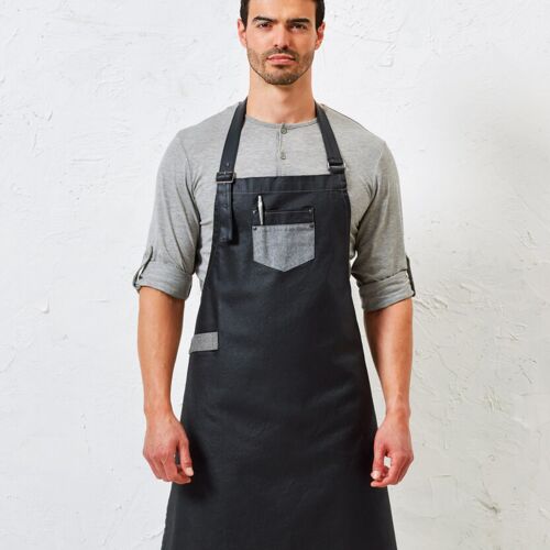 Premier Division waxed-look denim bib apron with faux leather PR136 Division waxed-look denim bib apron with faux leather Thumbnail